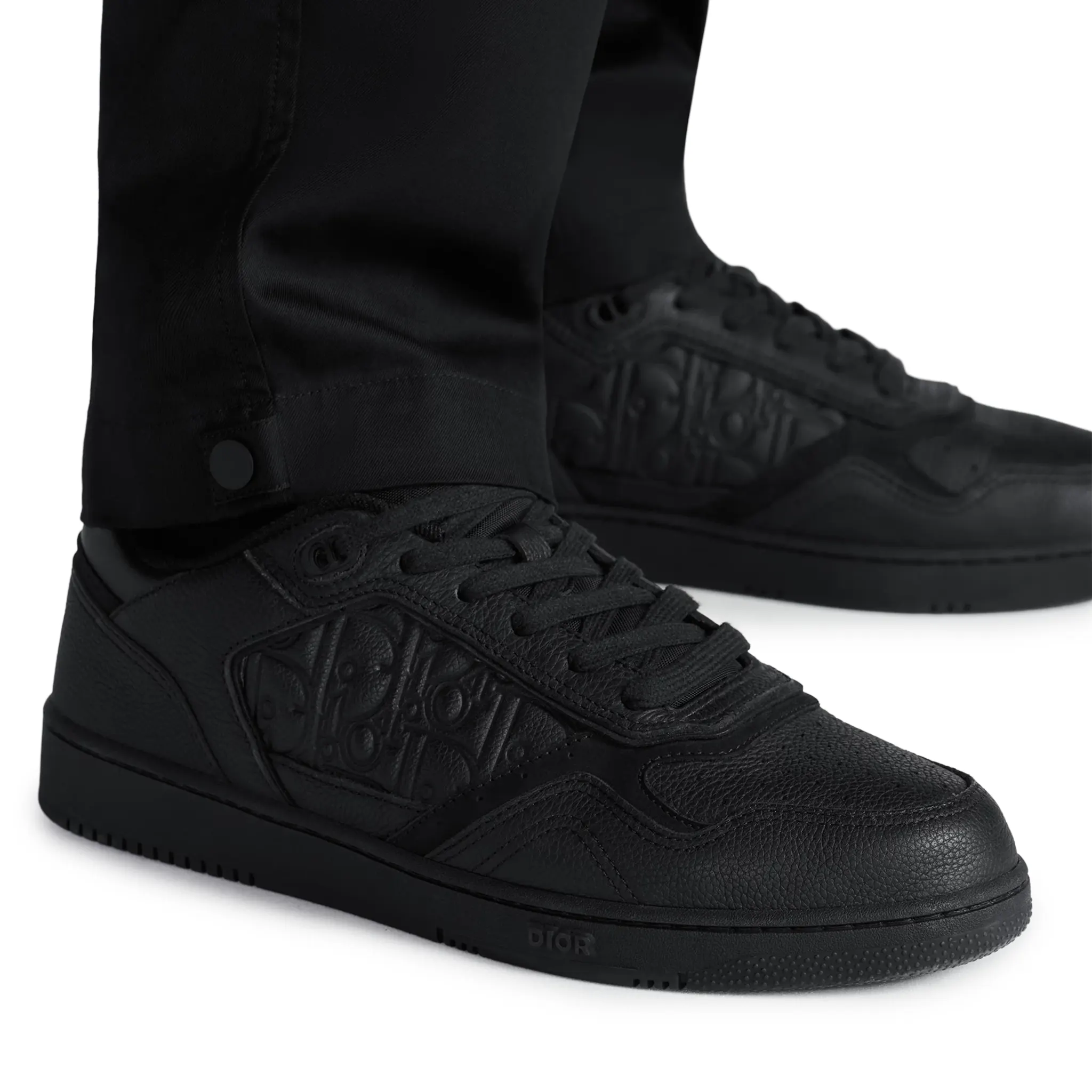 Model Wear Side View of Dior B27 Uptown Black Grained Calfskin Sneaker 3SN272ZAY_H900